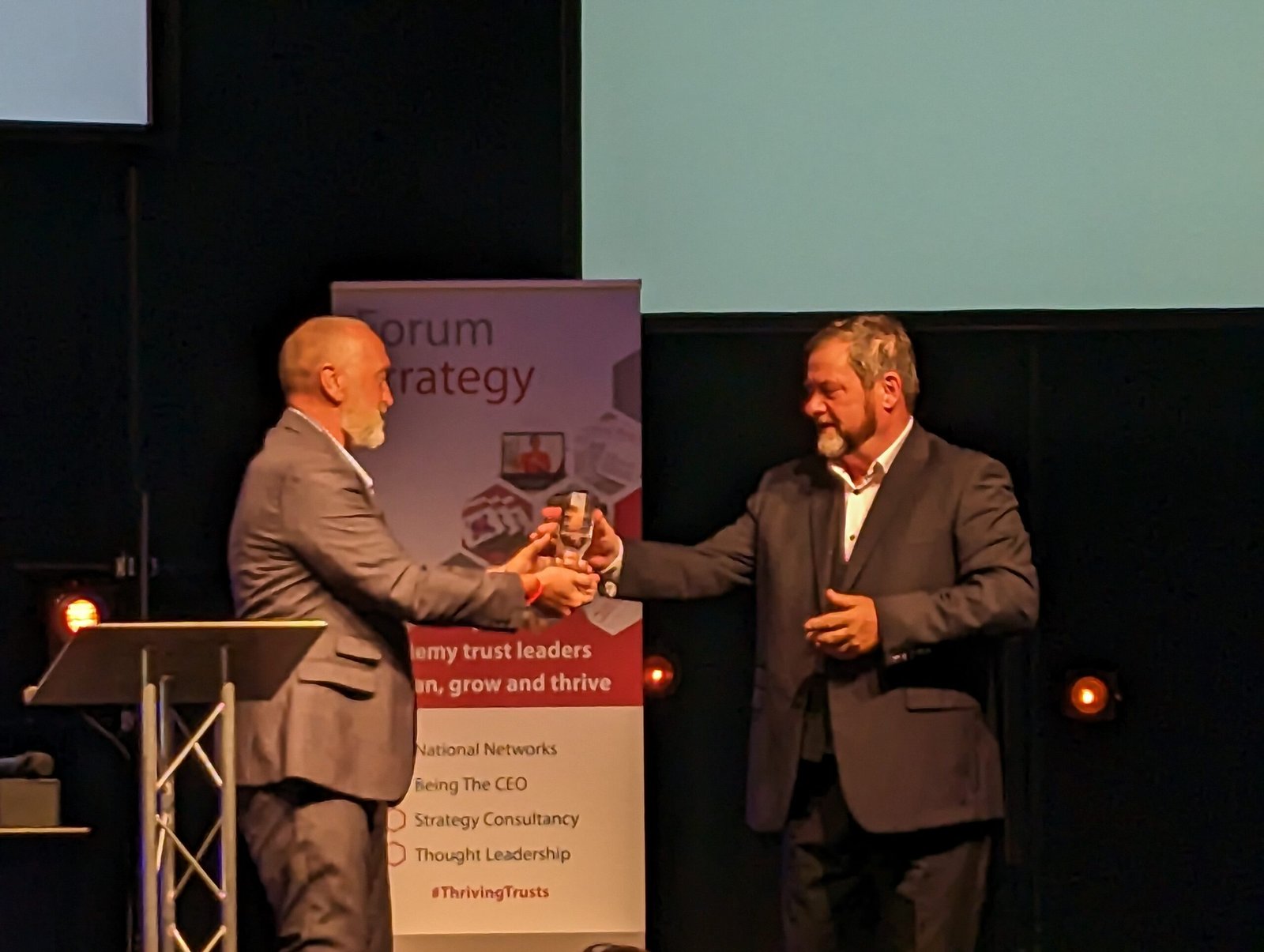Simon Bramwell accepts a Special Recognition award from Sir Steve Lancashire